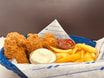 68. Paniert Wings mit Home fries